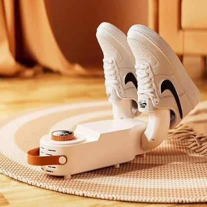 Electric shoe dryer with a timer and temperature control.